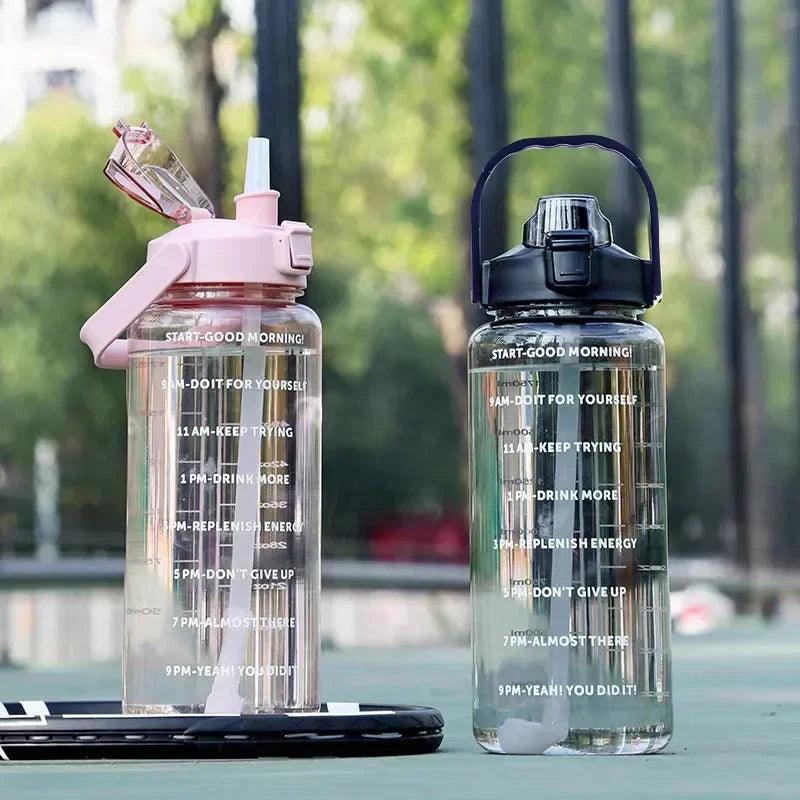 Stay Hydrated with Large Portable Travel Bottles Featuring Motivational Marks