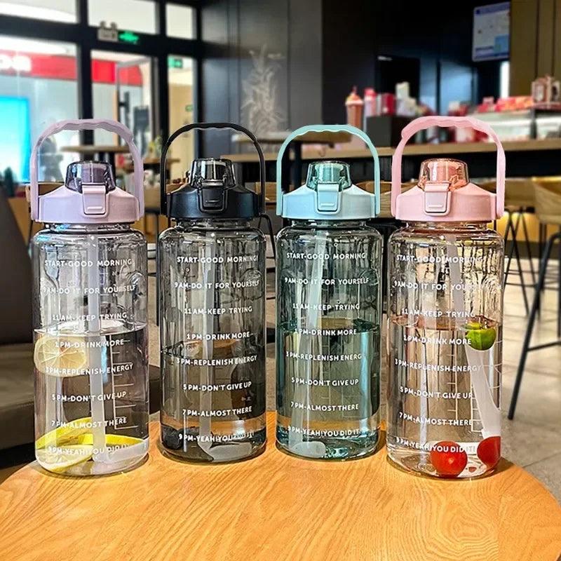 Stay Hydrated with Large Portable Travel Bottles Featuring Motivational Marks