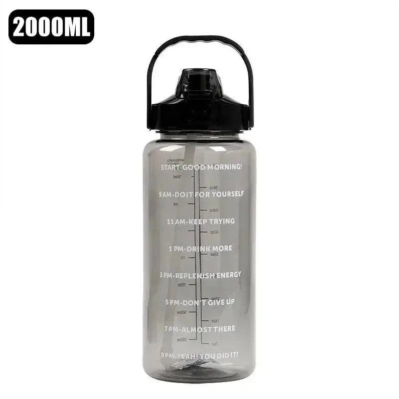 Stay Hydrated with Large Portable Travel Bottles Featuring Motivational Marks